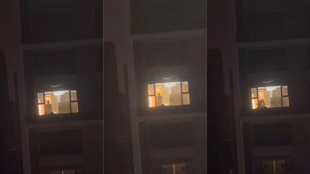 对面楼落地窗偷拍视频爆出 猛男窗前激情挑逗 尺度逆天引爆欲火！