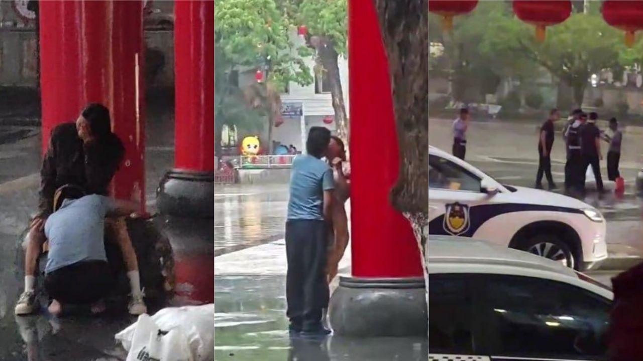 雨中五指山三月三广场小情侣旁若无人拥吻缠绵 男的竟钻进女裙底！
