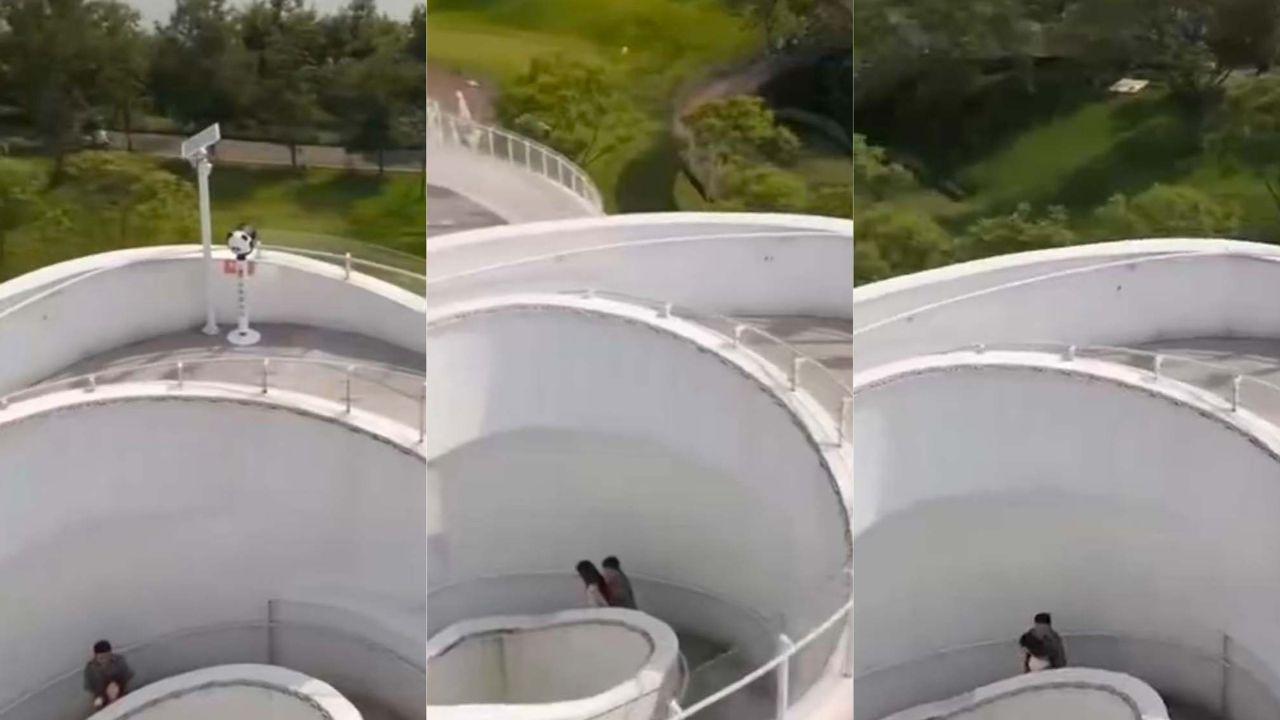 情侣旋转楼梯野战以为隐蔽 无人机意外录下激情瞬间全网炸裂！